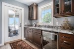 An Added Touch for Comfort - The Second Level Hallway Comes with a Kitchenette Complete with a Keurig and Access to the Screened-in Patio Room